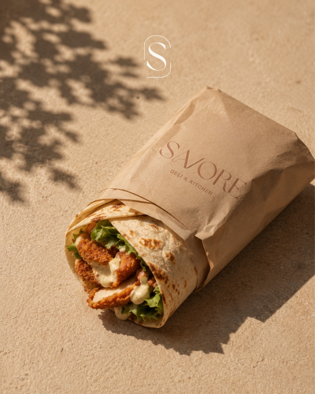 Crispy chicken wrap in a Savore kraft paper bag
